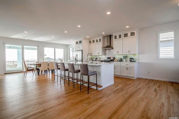 Dining room, Interior, Kitchen, Recessed Lighting, Stainless Steel Appliances, Wood Texture Flooring