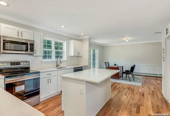 Dining room, Interior, Kitchen, Recessed Lighting, Stainless Steel Appliances, Wood Texture Flooring