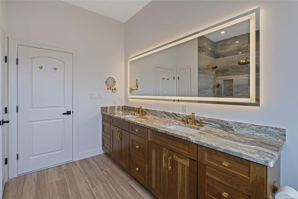 Bathroom, Dual Sink Vanities, Interior, Recessed Lighting, Wood Texture Flooring