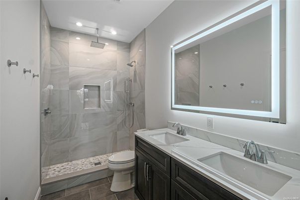 Bathroom, Dual Sink Vanities, Glass Shower, Interior, Marble Walls, Recessed Lighting