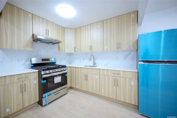Interior, Kitchen, Marble Walls, Stainless Steel Appliances, Wood Texture Flooring