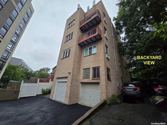 Attached, Exterior, Facade, Brick Facade, Condo Building