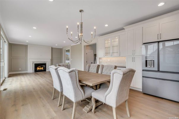Chandelier, Dining room, Fireplace, Interior, Kitchen, Recessed Lighting, Wood Texture Flooring