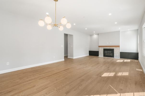 Empty room, Fireplace, Interior, Pendant Lights, Recessed Lighting, Wood Texture Flooring