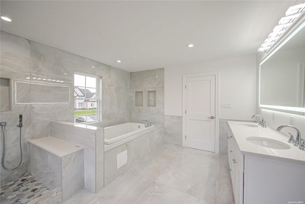 Bathroom, Dual Sink Vanities, Glass Shower, Interior, Marble Walls, Recessed Lighting