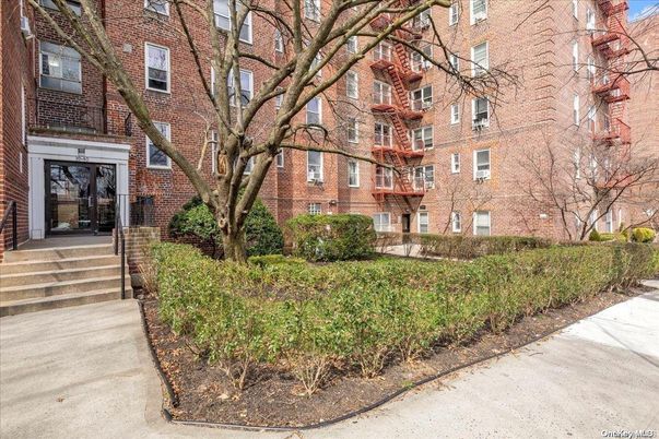 Exterior, Facade, Brick Facade, Condo Building
