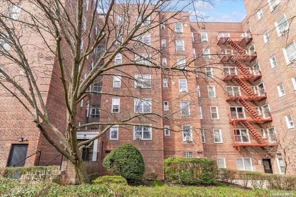 Exterior, Facade, Brick Facade, Condo Building