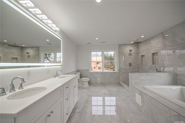 Bathroom, Dual Sink Vanities, Glass Shower, Interior, Marble, Recessed Lighting
