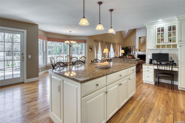 Chandelier, Dining room, Fireplace, Interior, Pendant Lights, Wood Texture Flooring