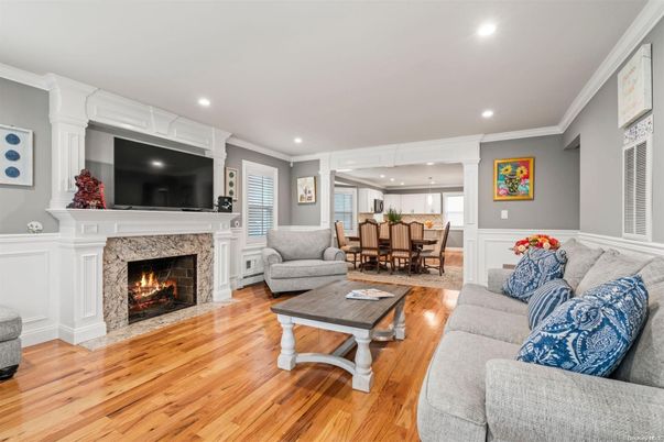 Dining room, Fireplace, Interior, Living room, Pendant Lights, Recessed Lighting, Wood Texture Flooring