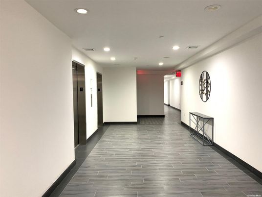 Elevator, Interior, Recessed Lighting, Wood Texture Flooring