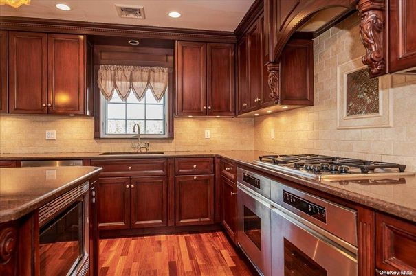 Interior, Kitchen, Recessed Lighting, Stainless Steel Appliances, Stone Walls, Wood Texture Flooring