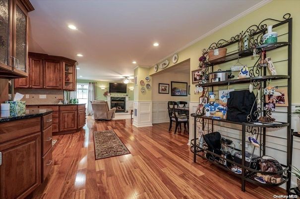 Dining room, Fireplace, Interior, Kitchen, Living room, Recessed Lighting, Wood Texture Flooring