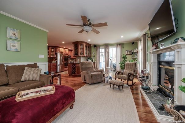 Fireplace, Interior, Kitchen, Living room, Recessed Lighting, Stainless Steel Appliances, Wood Texture Flooring