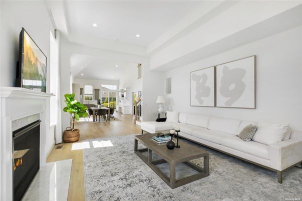 Dining room, Fireplace, Interior, Living room, Recessed Lighting, Wood Texture Flooring