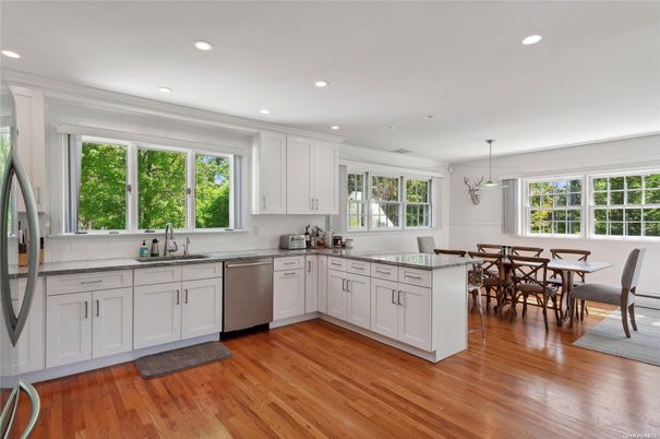 Dining room, Interior, Kitchen, Pendant Lights, Recessed Lighting, Stainless Steel Appliances, Wood Texture Flooring