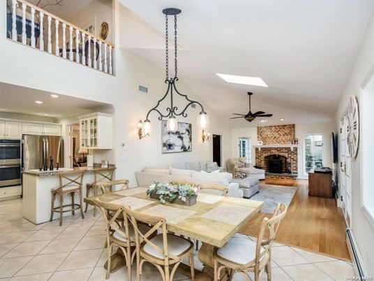 Dining room, Fireplace, Interior, Kitchen, Living room, Pendant Lights, Recessed Lighting, Stainless Steel Appliances, Stone Walls, Wood Texture Flooring