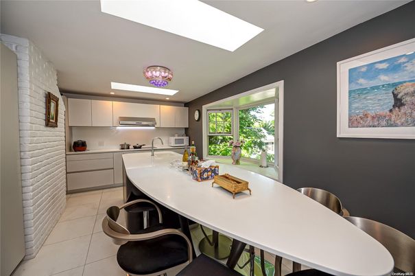 Interior, Kitchen, Recessed Lighting, Stainless Steel Appliances, Stone Walls