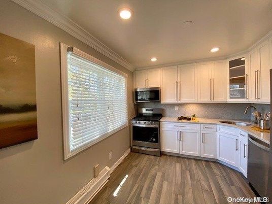 Interior, Kitchen, Recessed Lighting, Stainless Steel Appliances, Wood Texture Flooring