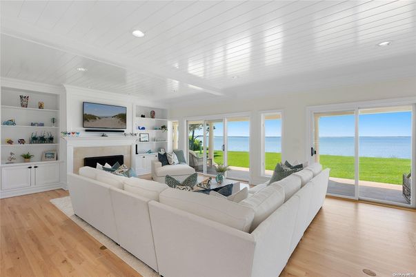 Fireplace, Interior, Living room, Recessed Lighting, Water, Wood Texture Flooring