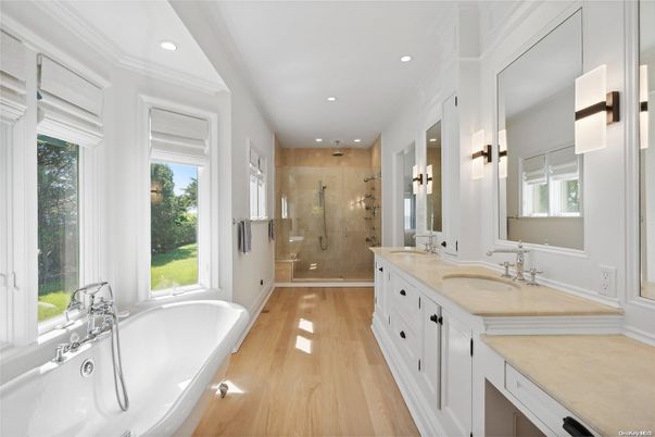 Bathroom, Dual Sink Vanities, Glass Shower, Interior, Recessed Lighting, Wood Texture Flooring