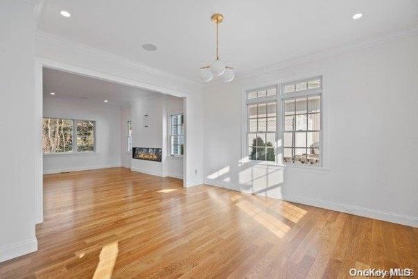 Empty room, Fireplace, Interior, Pendant Lights, Recessed Lighting, Wood Texture Flooring