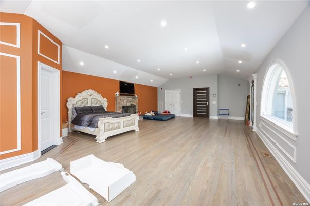 Bedroom, Fireplace, Interior, Recessed Lighting, Wood Texture Flooring