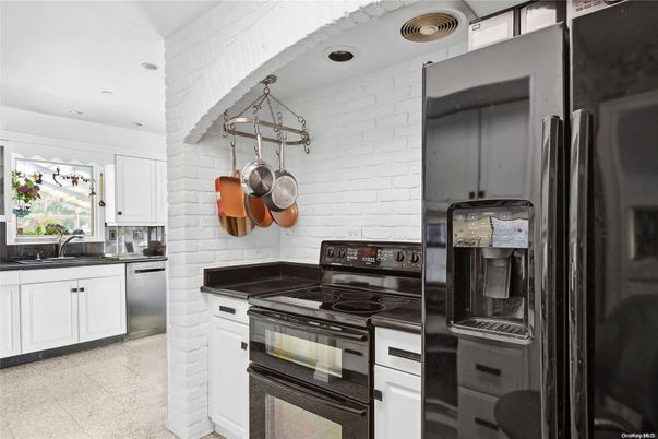 Interior, Kitchen, Recessed Lighting, Stainless Steel Appliances, Stone Walls