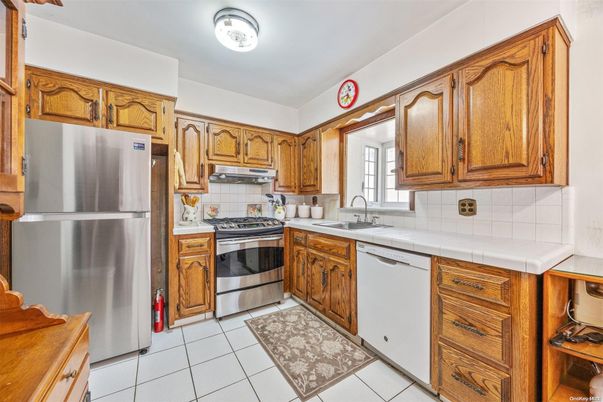 Interior, Kitchen, Stainless Steel Appliances, Tile Countertops