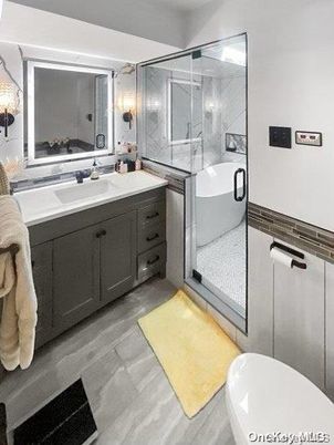 Bathroom, Dual Sink Vanities, Free Standing Baths, Glass Shower, Interior, Wood Texture Flooring