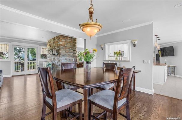 Dining room, Fireplace, Interior, Pendant Lights, Stone Walls, Wood Texture Flooring