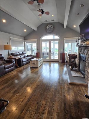 Dining room, Fireplace, Interior, Living room, Recessed Lighting, Wood Texture Flooring