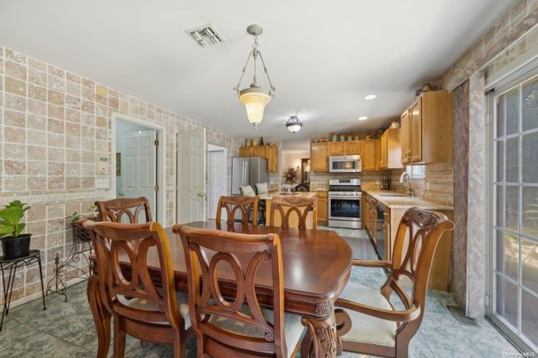 Dining room, Interior, Kitchen, Pendant Lights, Recessed Lighting, Stainless Steel Appliances, Stone Walls
