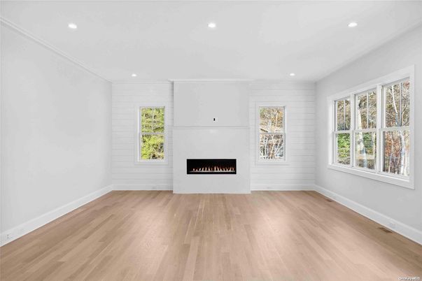Empty room, Fireplace, Interior, Recessed Lighting, Wood Texture Flooring