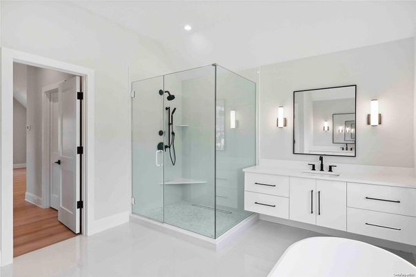 Bathroom, Dual Sink Vanities, Glass Shower, Interior, Recessed Lighting, Wood Texture Flooring