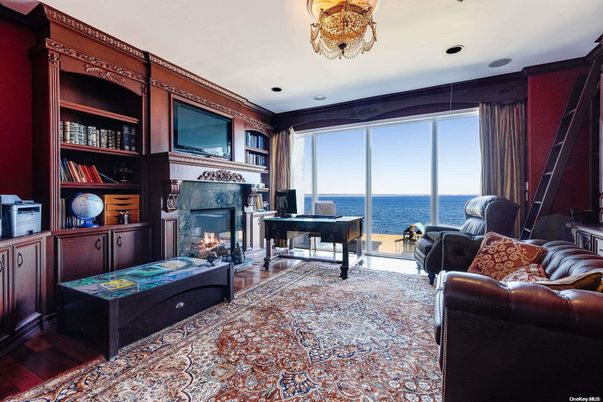 Fireplace, Interior, Living room, Recessed Lighting, Water, Wood Texture Flooring