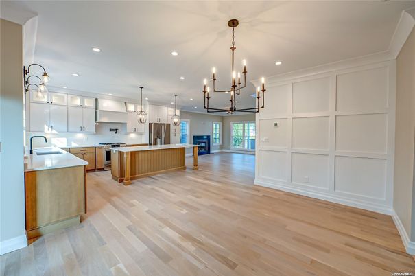 Chandelier, Interior, Kitchen, Pendant Lights, Recessed Lighting, Stainless Steel Appliances, Wood Texture Flooring