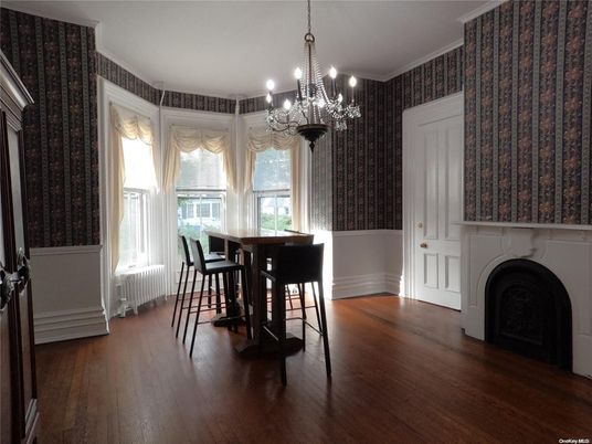 Chandelier, Dining room, Fireplace, Interior, Wood Texture Flooring