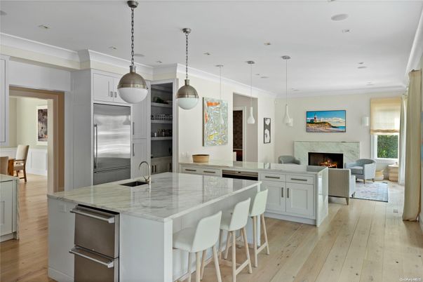 Fireplace, Interior, Kitchen, Living room, Pendant Lights, Recessed Lighting, Stainless Steel Appliances, Wood Texture Flooring