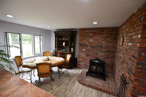 Dining room, Fireplace, Interior, Recessed Lighting, Stone Walls