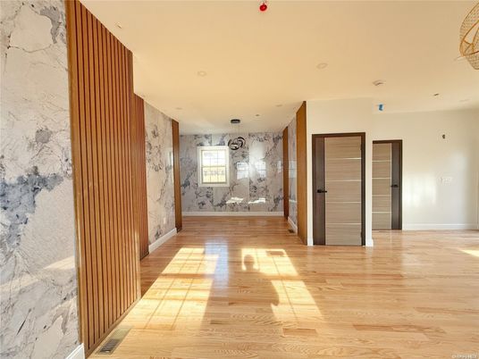 Interior, Marble Walls, Recessed Lighting, Wood Texture Flooring