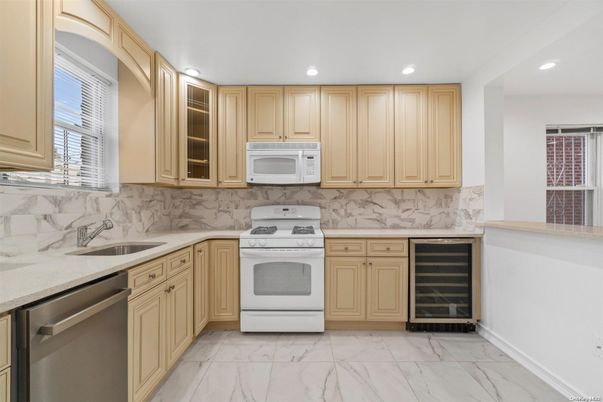 Interior, Kitchen, Marble, Marble Walls, Recessed Lighting, Stainless Steel Appliances