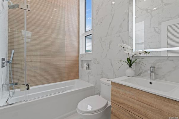 Bathroom, Glass Shower, Interior, Marble Walls, Wood Texture Flooring