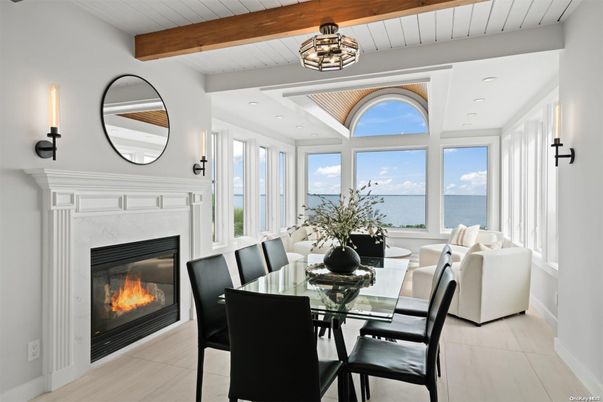 Dining room, Fireplace, Interior, Recessed Lighting, Water, Wooden Beams