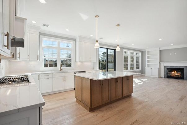 Fireplace, Interior, Kitchen, Pendant Lights, Recessed Lighting, Wood Texture Flooring