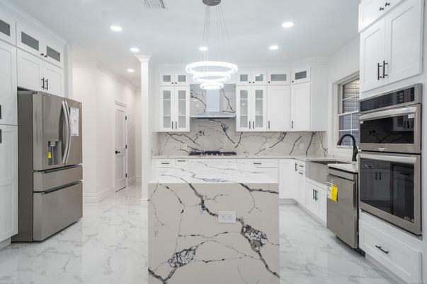 Interior, Kitchen, Marble, Marble Walls, Pendant Lights, Recessed Lighting, Stainless Steel Appliances