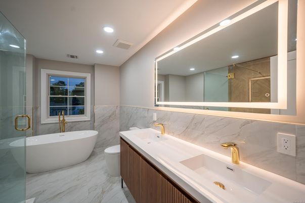 Bathroom, Dual Sink Vanities, Free Standing Baths, Glass Shower, Interior, Marble, Marble Walls, Recessed Lighting