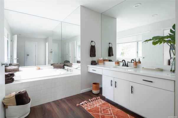 Bathroom, Dual Sink Vanities, Interior, Recessed Lighting, Wood Texture Flooring