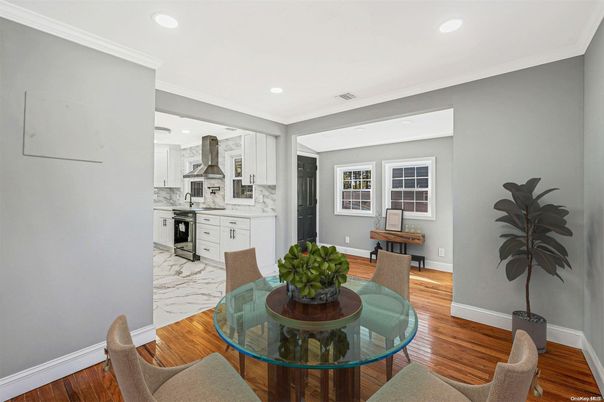 Dining room, Interior, Kitchen, Marble, Recessed Lighting, Stainless Steel Appliances, Wood Texture Flooring