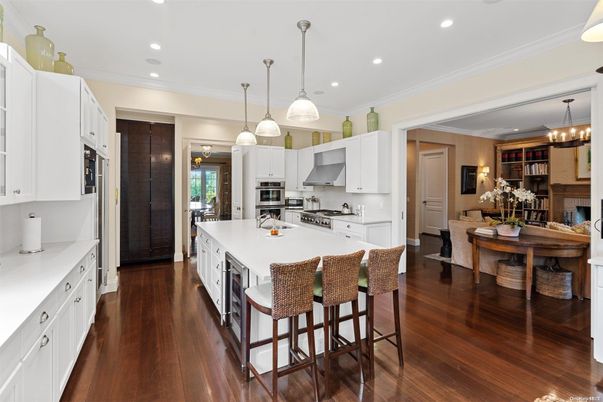 Chandelier, Dining room, Interior, Kitchen, Pendant Lights, Recessed Lighting, Stainless Steel Appliances, Wood Texture Flooring